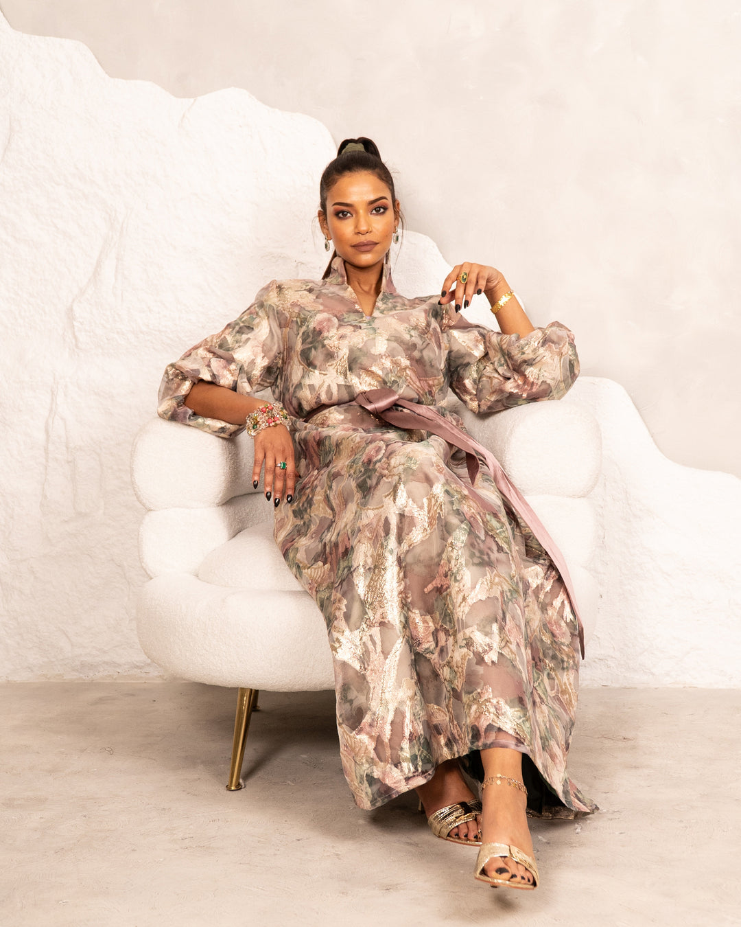 turkish organza dress An enchanting dusty peach Turkish organza layered with net and adorned in a symphony of multicolour butterflies, florals and shimmering stones. The corset top sculpts the waist, the sheath skirt flows with